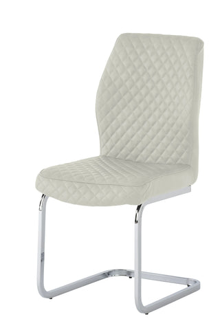 Cream dining chair with diamond quilted upholstery and chrome cantilever legs