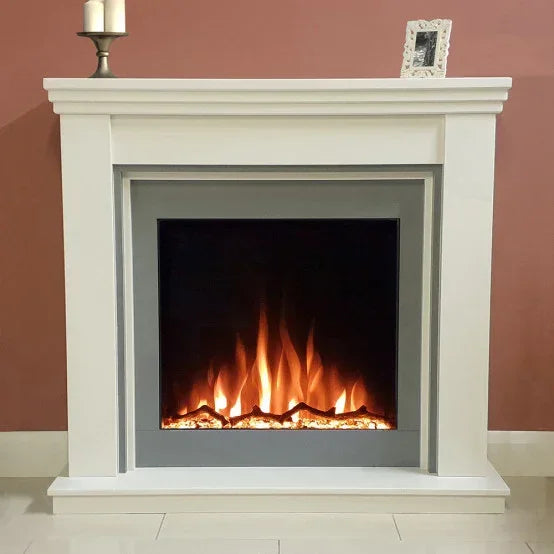 White electric fireplace with orange flame effect against a pink wall