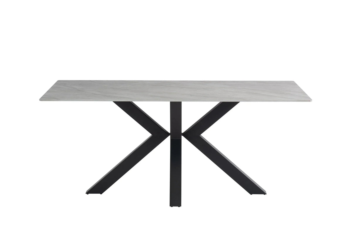 Rectangular dining table with marble effect top and black metal cross base, front view