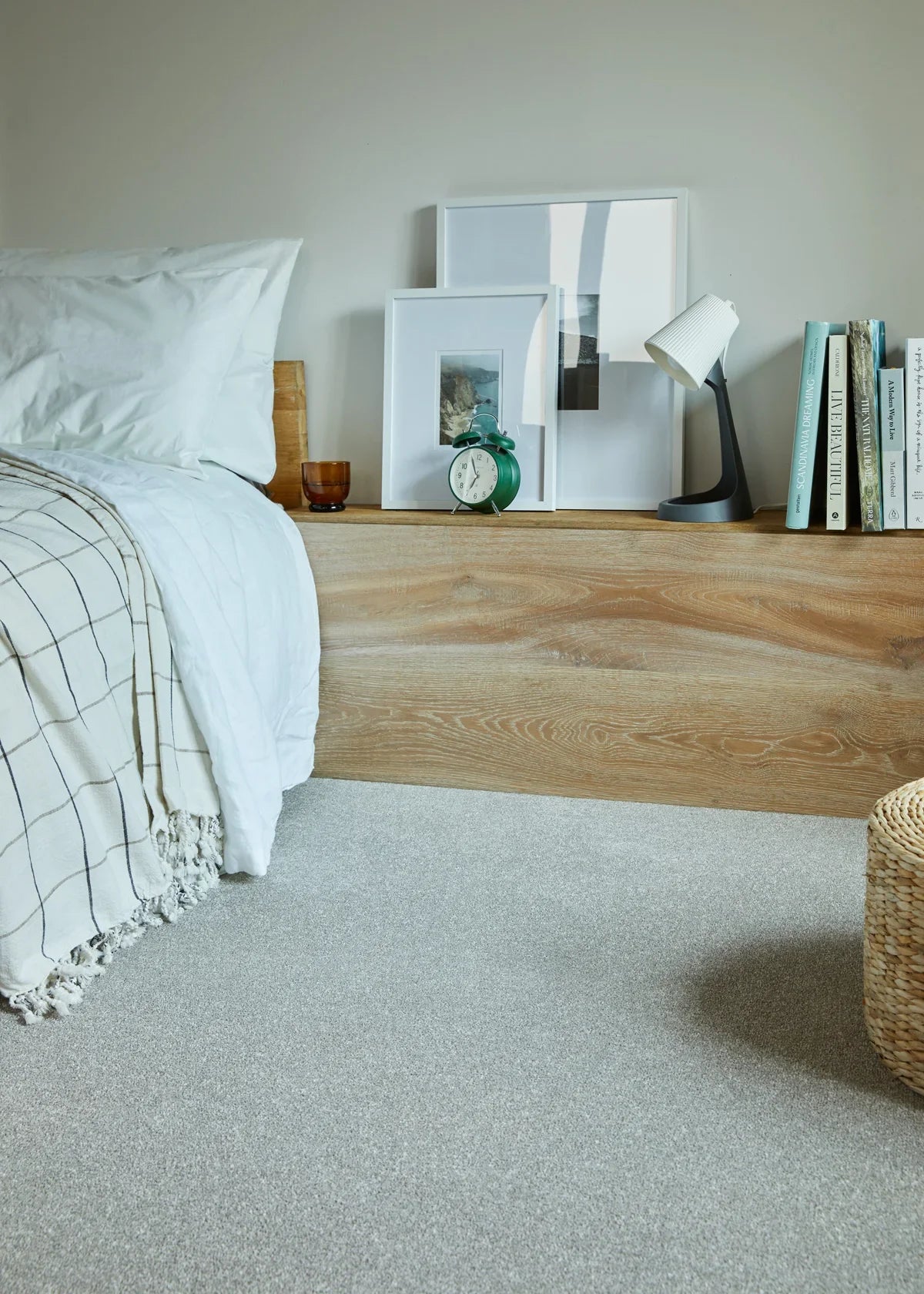 Kingston Pale Oak carpet in bedroom with light wood headboard and modern decor