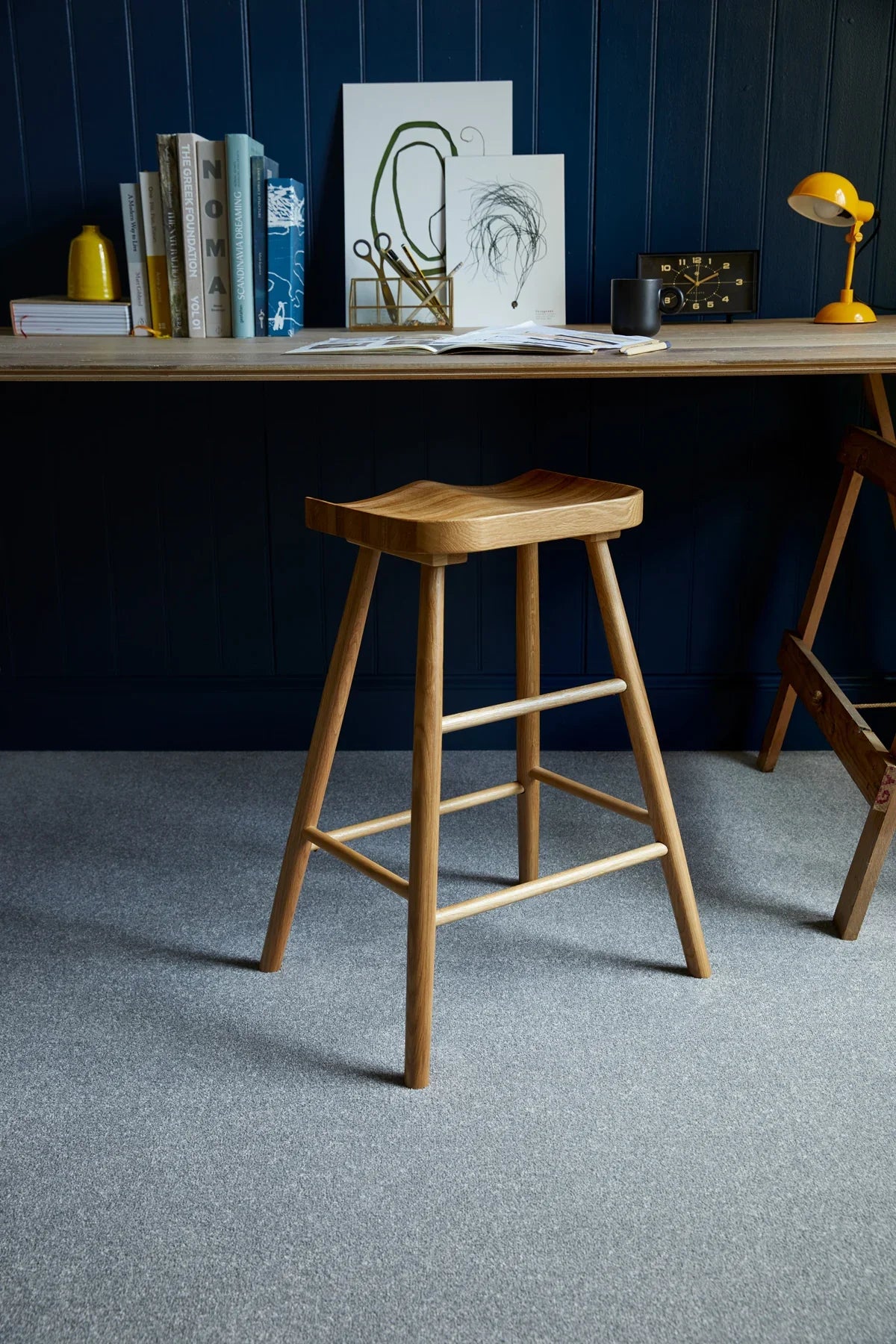 Apollo Plus Homer Ton Grey carpet in modern home office with wooden stool