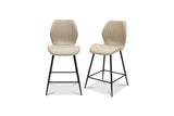 Two modern bar stools with beige ribbed upholstered seats and backs and black metal legs, shown on a plain white background.