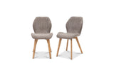 Two modern dining chairs with textured taupe bouclé seats and backs and light natural wood legs, shown on a plain white background.