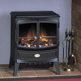 Freestanding electric stove heater with glass doors and log effect flame on tiled hearth