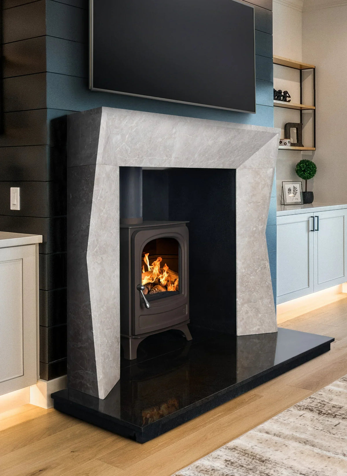Nimbus Grey marble fireplace surround with wood burning stove in modern living room