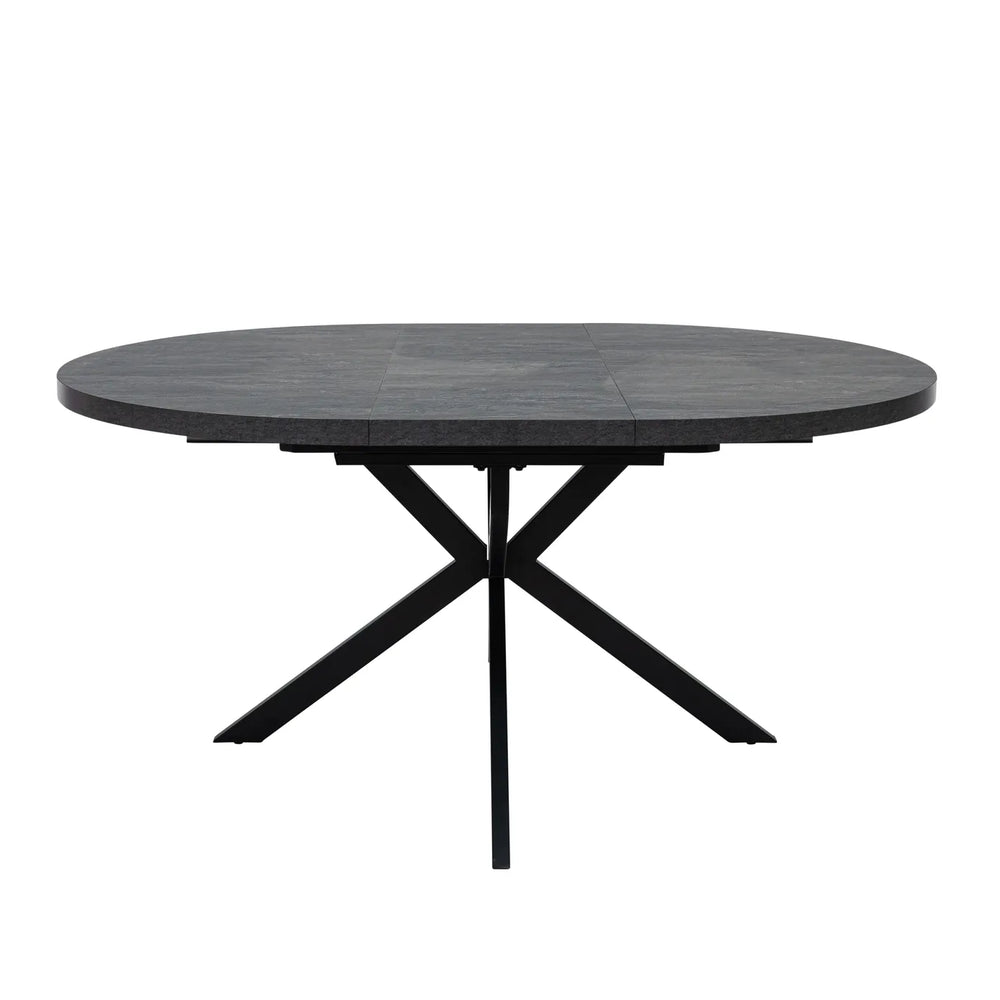 A round black dining table with a dark textured top and a black metal X-shaped pedestal base, shown against a plain white background.