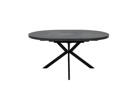 A round black dining table with a dark textured top and a black metal X-shaped pedestal base, shown against a plain white background.