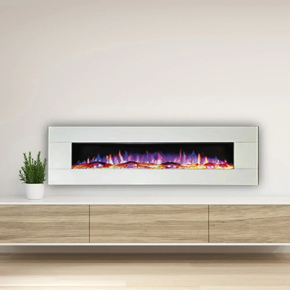 Wall mounted white electric fire with glass panel above modern low wooden cabinet