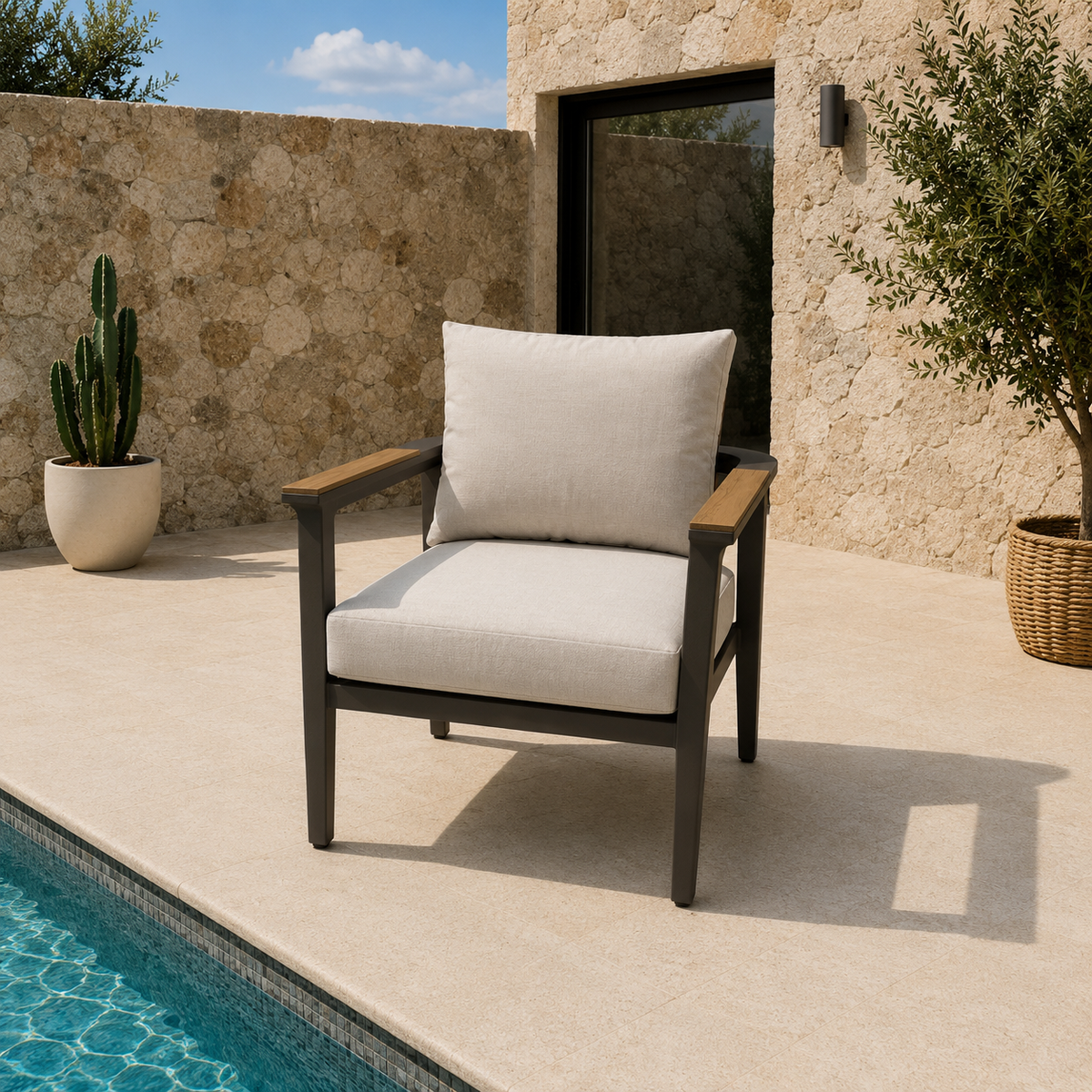 Beige cushioned chair with dark frame and wooden armrests next to a swimming pool