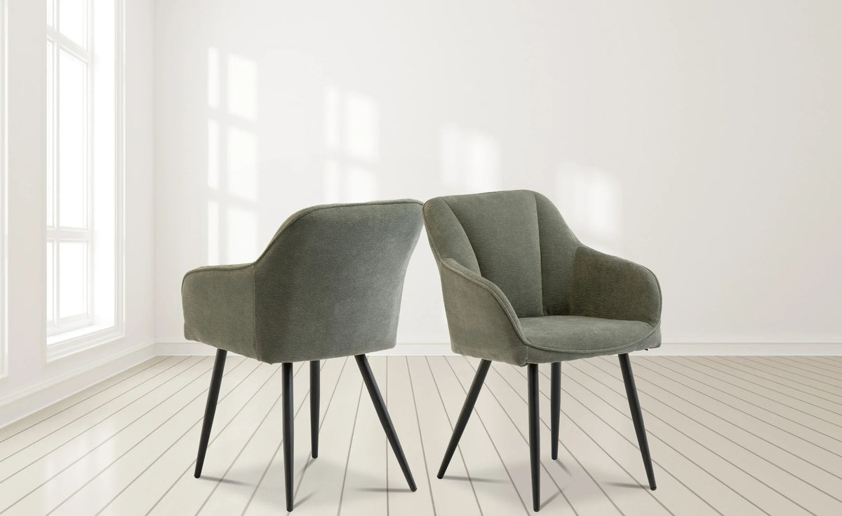 Pair of grey upholstered accent chairs with metal legs on light wood floor