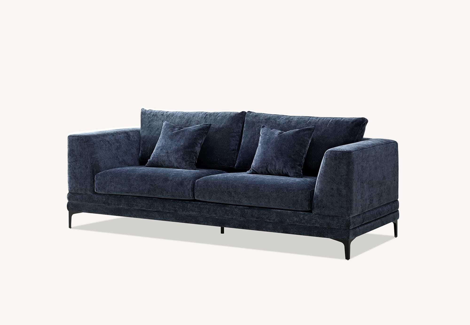Blue velvet sofa with two matching cushions and slim black metal legs
