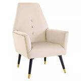 Beige velvet accent chair with button backrest, black tapered legs, gold tips, white background