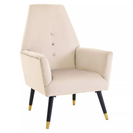 Beige velvet accent chair with button backrest, black tapered legs, gold tips, white background