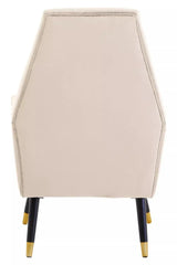 Stone velvet accent chair rear view, black tapered legs with gold tips, clean lines