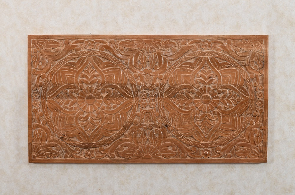 Handcrafted mango wood bedframe with intricate artwork detailing