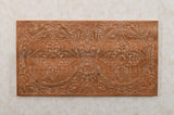Handcrafted mango wood bedframe with intricate artwork detailing