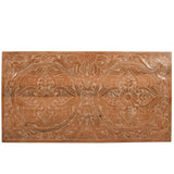 Handcrafted mango wood bedframe with intricate artwork detailing