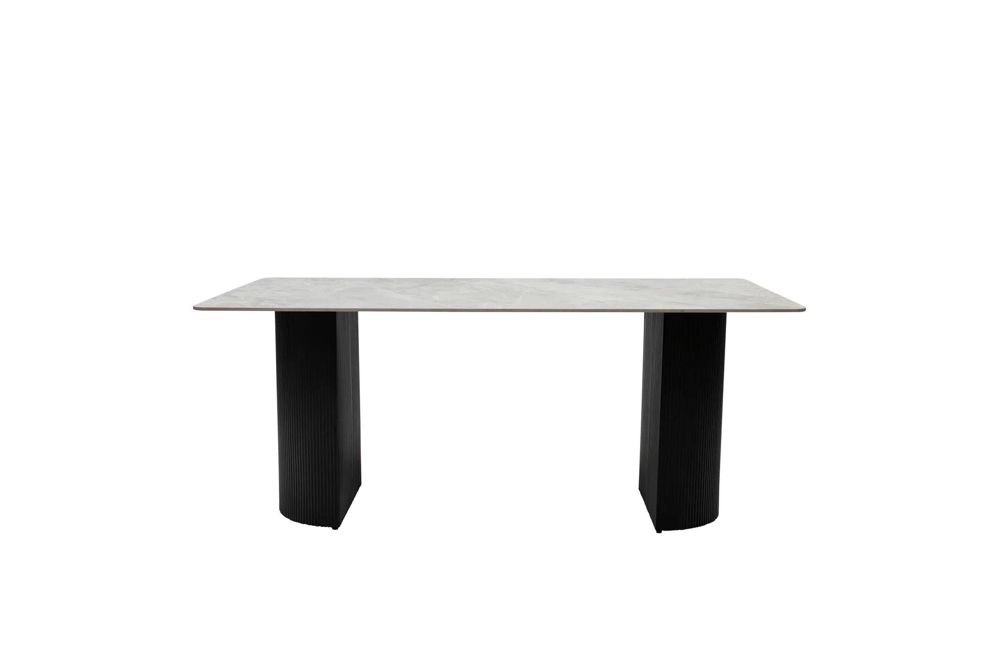 A modern rectangular dining table with a light gray stone or concrete-look top and two thick black pedestal legs, shown against a plain white background.