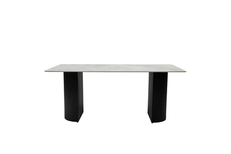 A modern rectangular dining table with a light gray stone or concrete-look top and two thick black pedestal legs, shown against a plain white background.