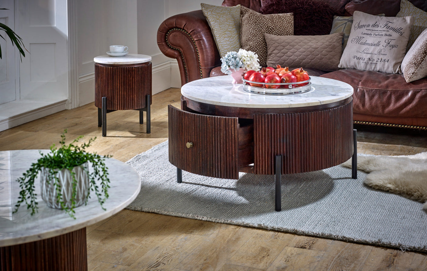 Opal round coffee table with marble top and fluted mango wood surround