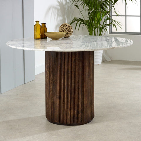 Round Opal dining table with mango wood pedestal and marble top