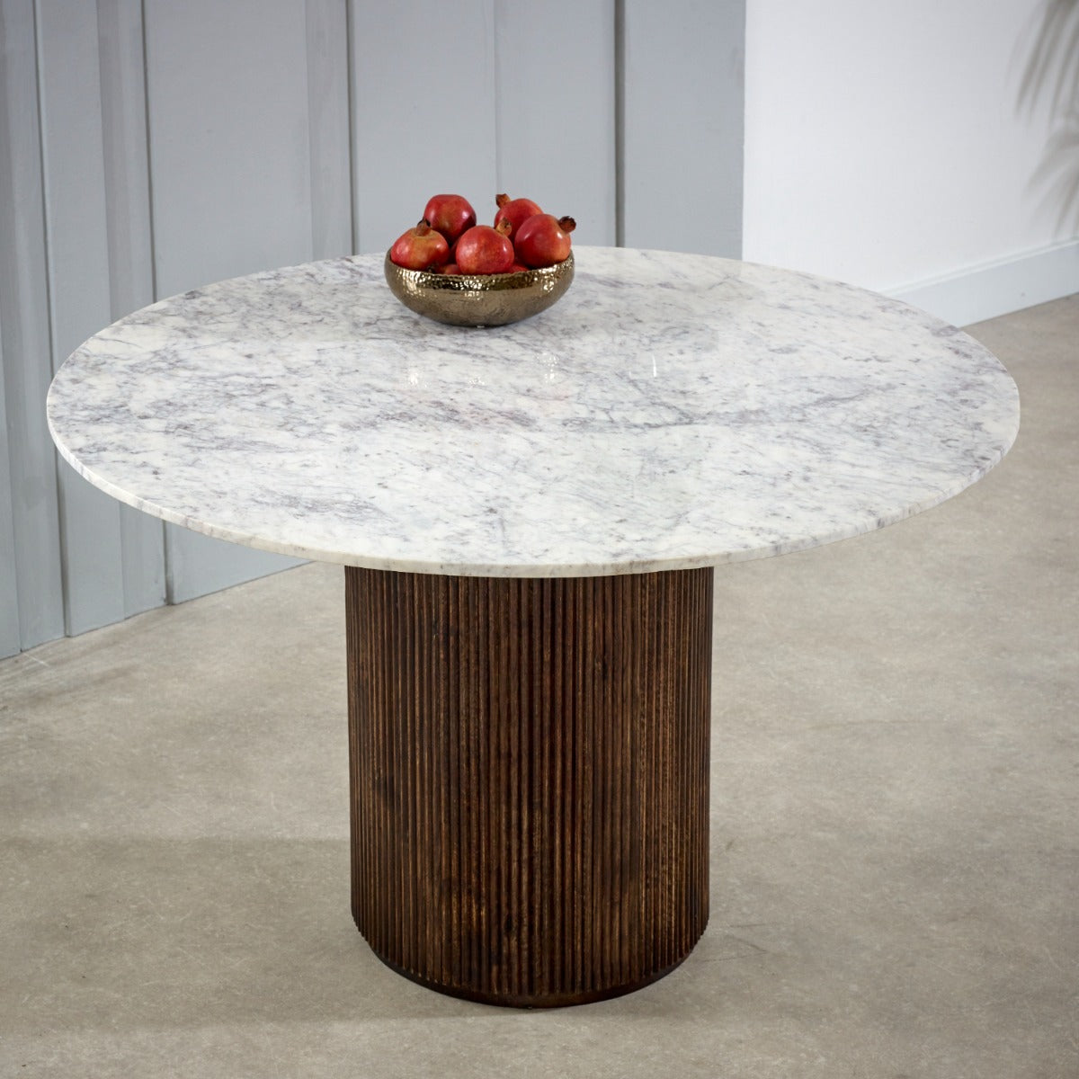Round Opal dining table with mango wood pedestal and marble top