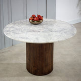 Round Opal dining table with mango wood pedestal and marble top