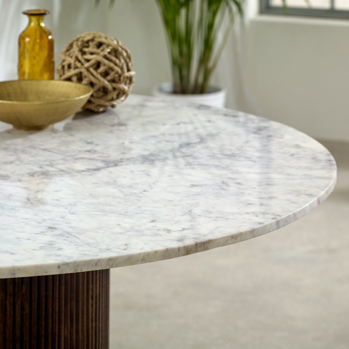 Round Opal dining table with mango wood pedestal and marble top