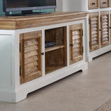 Alfie TV cabinet in solid mango wood with a whiteish finish
