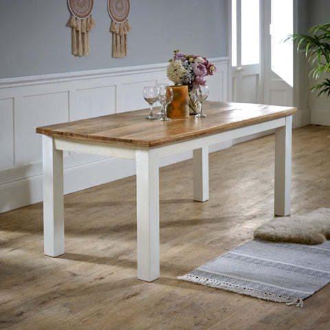 Alfie Dining Table made of solid mango wood with a whiteish finish