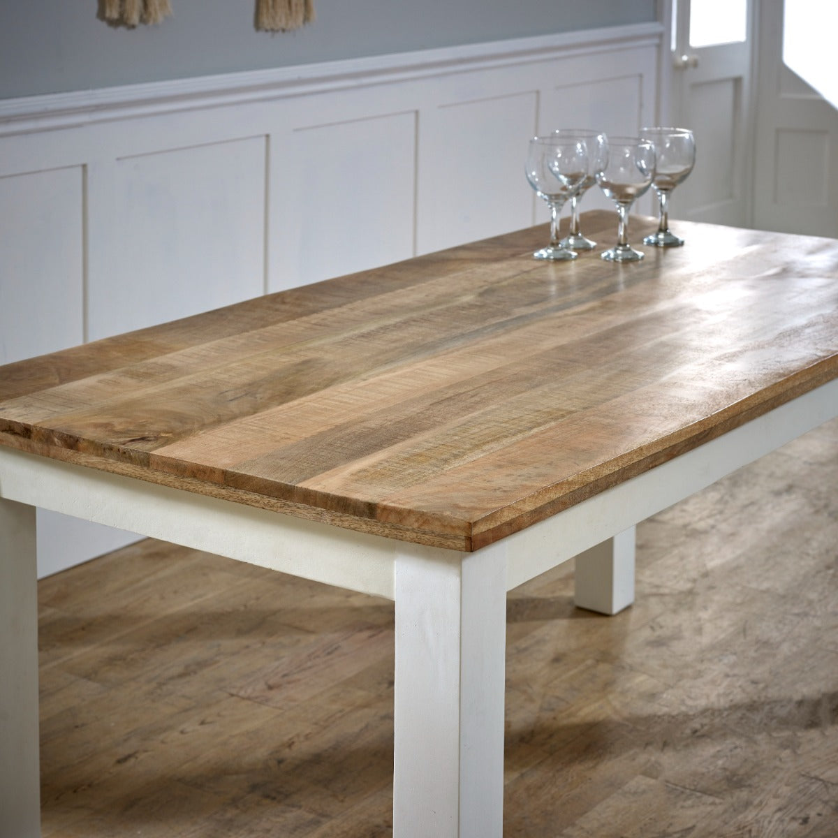 Alfie Dining Table made of solid mango wood with a whiteish finish