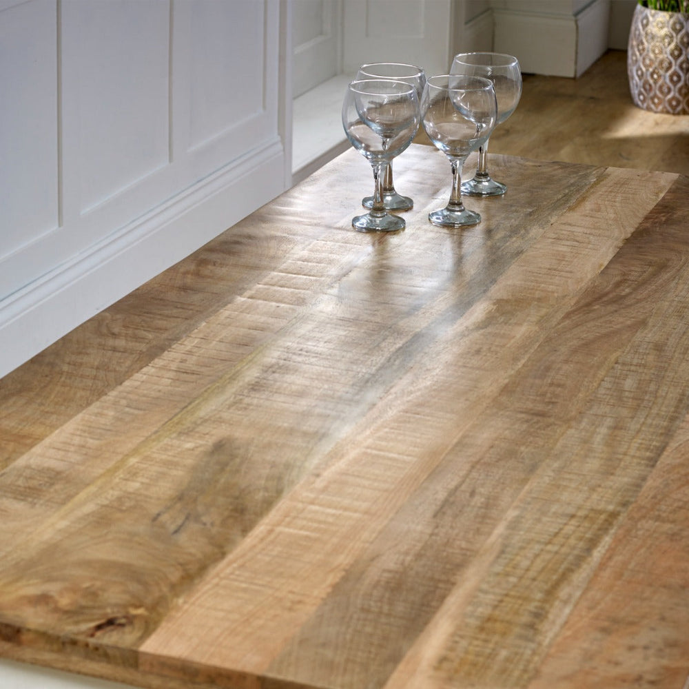 Alfie Dining Table made of solid mango wood with a whiteish finish