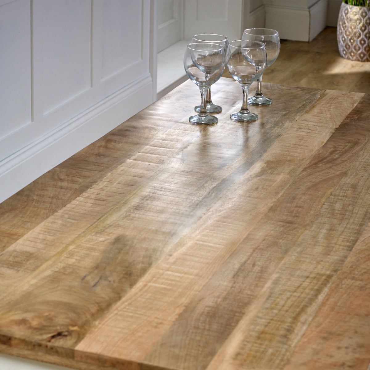 Alfie Dining Table made of solid mango wood with a whiteish finish