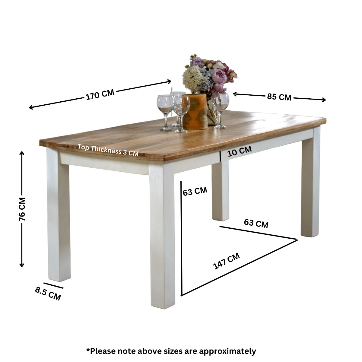 Alfie Dining Table made of solid mango wood with a whiteish finish
