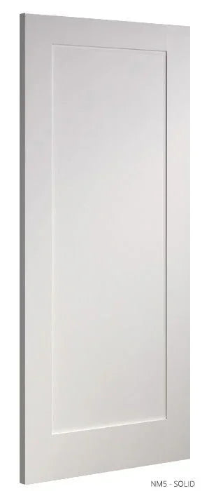 Solid primed internal door with simple rectangular panel design, angled side view