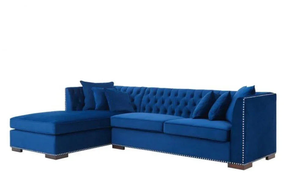 Blue velvet corner sofa with tufted back, stud detailing, chaise lounge and matching cushions