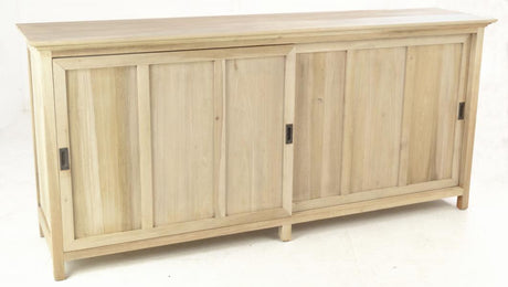 Light wood storage unit with sliding panel doors and recessed handles