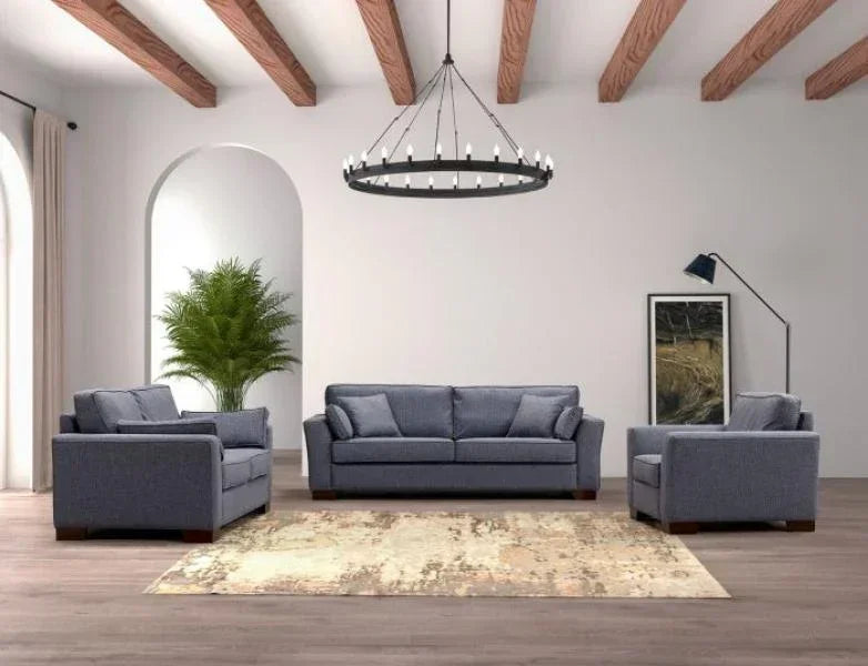 Grey fabric sofa set in modern living room with wood beams and beige rug