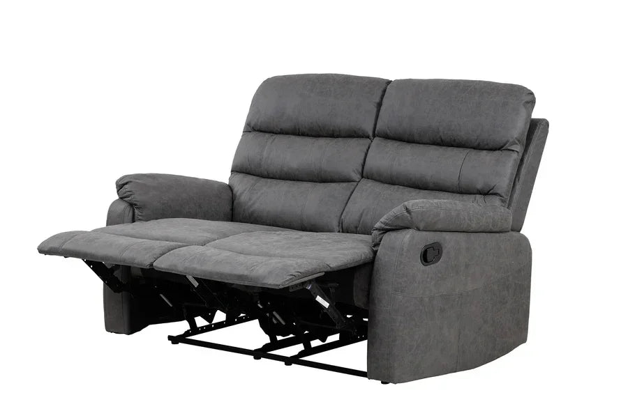 Grey fabric recliner sofa with padded armrests and extended footrests, angled side view