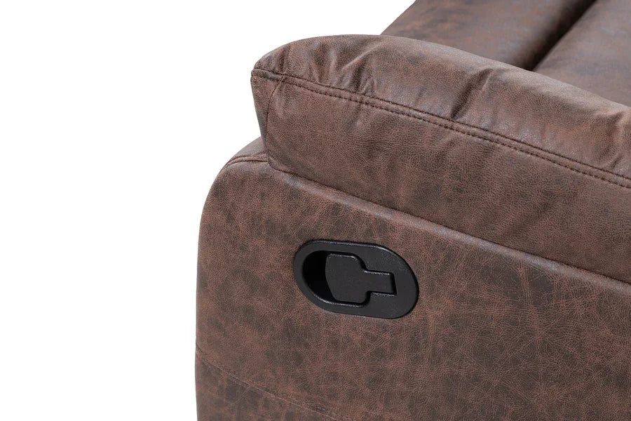 Brown leather sofa arm with recliner handle detail