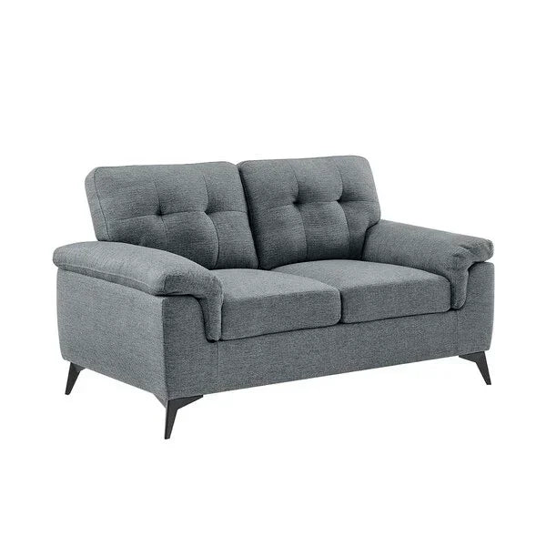 Grey fabric two seater sofa with tufted back cushions and slim black legs
