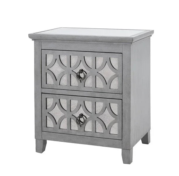 Grey bedside table with mirrored drawers and geometric patterns