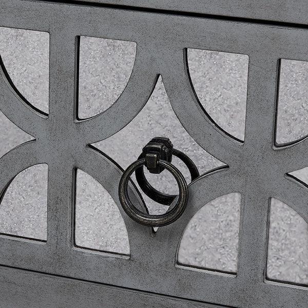 Metal furniture bench detail with geometric pattern and black ring handle