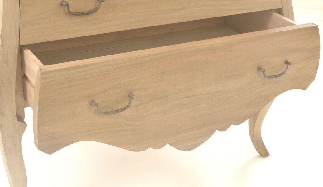 Open drawer on wooden chest with curved handles and decorative legs