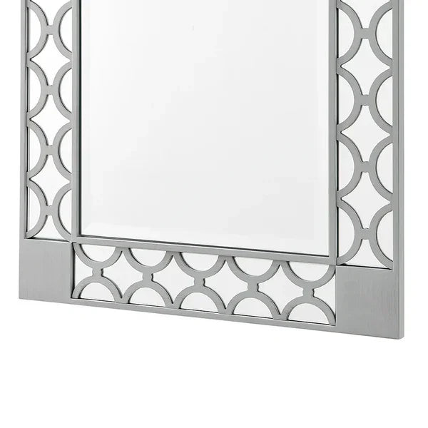 Rectangular wall mirror with silver geometric metal frame, corner and edge detail shown