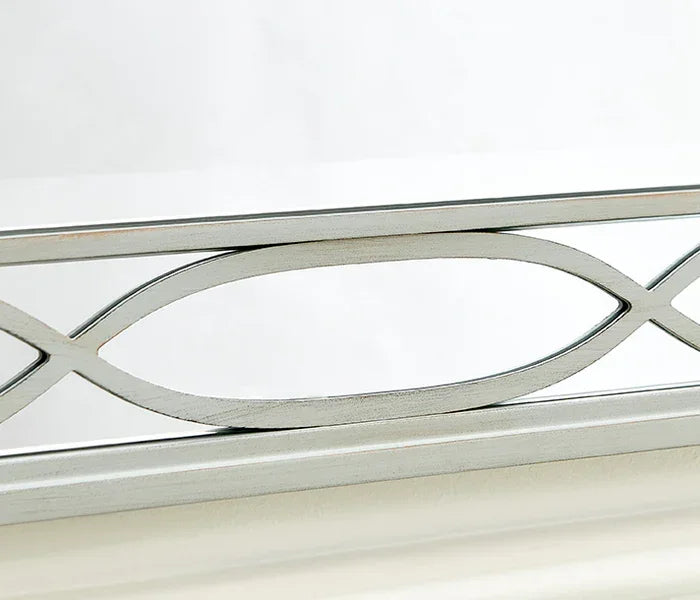 Silver metal bed frame headboard with oval and cross pattern detail