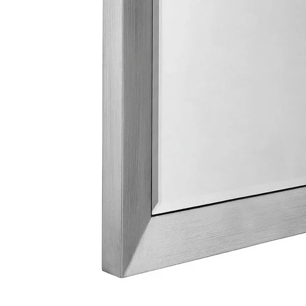 Brushed silver metal mirror frame corner with clean edges and modern design