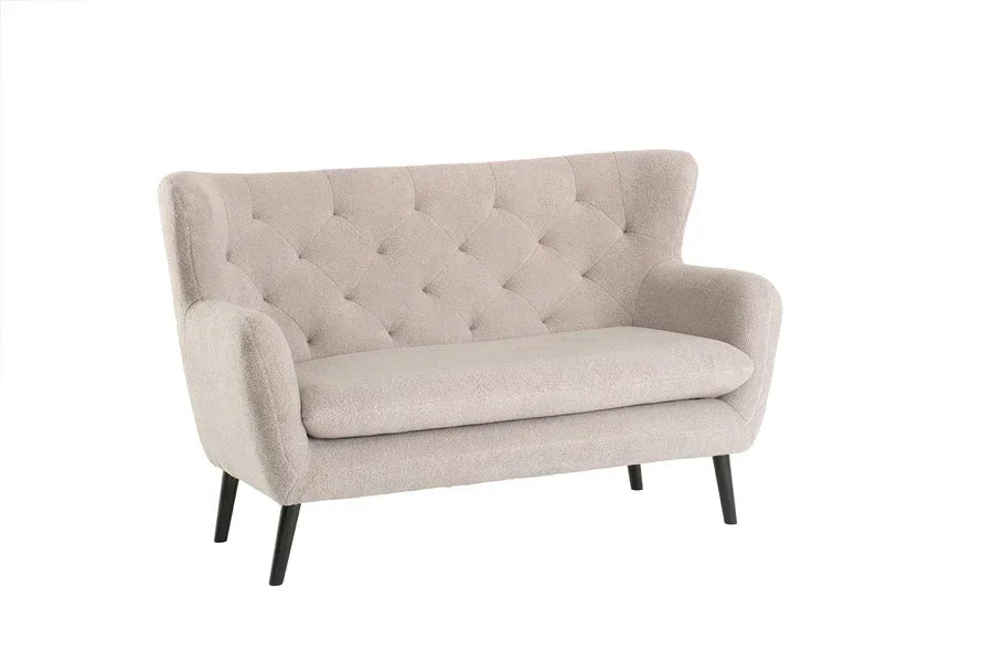 Beige fabric loveseat sofa with tufted backrest and black legs
