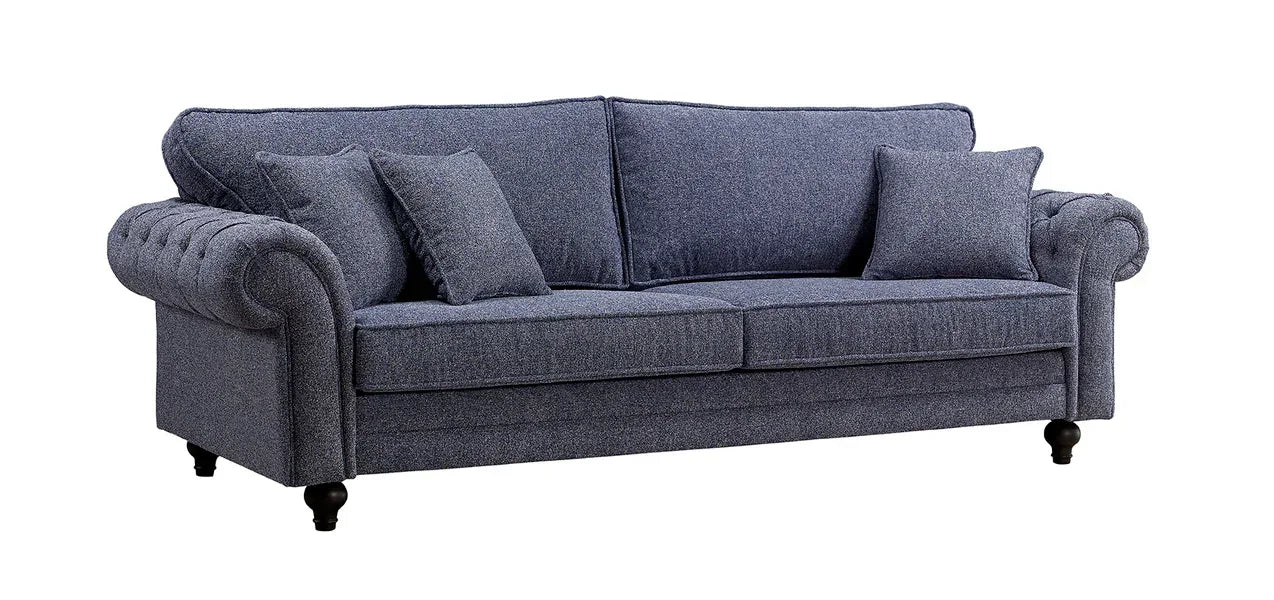 Blue fabric sofa with rolled arms, three seat cushions and matching scatter cushions