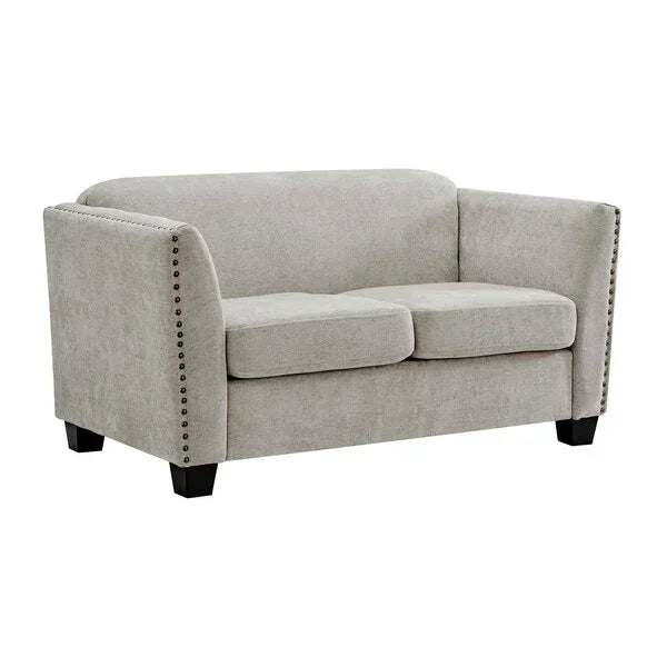Light grey fabric sofa with studded armrests and black wooden legs, front angle view